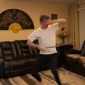 Guy Displays Impressive Moves And Postures While Performing an Act Using Sword