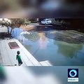 Footage shows a driver rescuing a child from drowning in a giant pothole in the Northwestern city of Parsabad in Ardabil province