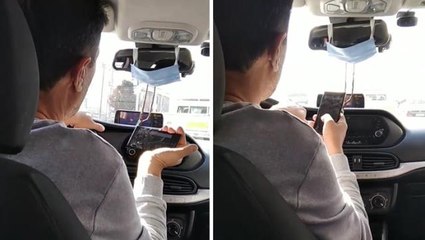 Bir türlü uslanmıyorlar! Kadın yolcu, seyir halindeyken at yarışı izleyen taksiciyi kameraya aldı