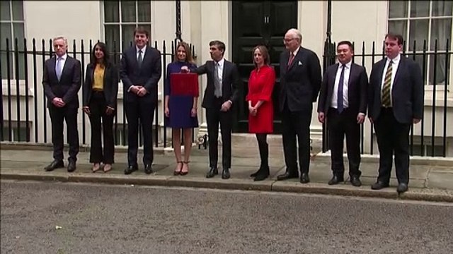 Chancellor Rishi Sunak poses with ministerial Red Box ahead of Budget speech