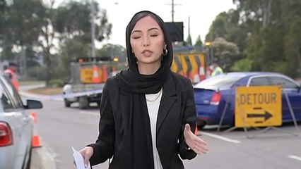 Authorities work to contain blaze after two-truck crash in Sydney's west