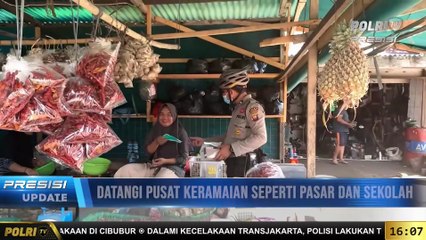 PRESISI Update 16.00 WIB : Sabhara Polres Ketapang Keliling Pemukiman Warga Bagikan Masker
