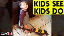 ''Monkey see, monkey do' - Cute toddler 'helps' mom with vacuuming the floor '