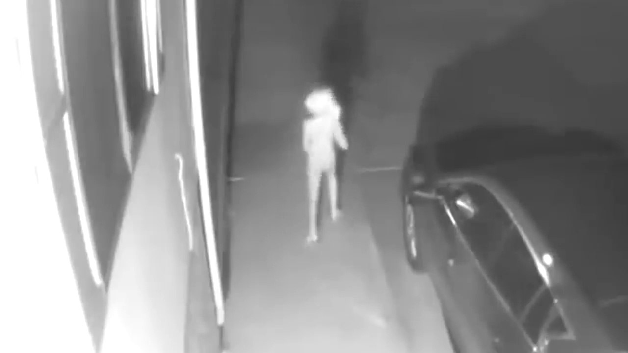 Alien Caught on Camera (News Report) Mysterious late night visitor. from another world
