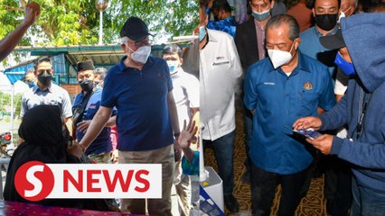Organisers of Muhyiddin and Najib’s walkabouts slapped with RM20,000 and RM4,000 fines