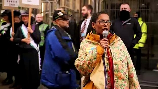 Extinction Rebellion activists protest outside JP Morgan in Glasgow