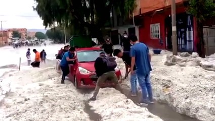 Severe hailstorm floods streets of Bolivian city