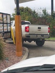 Truck in Taco Bell Drive-Through Takes Out Pole