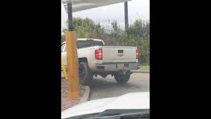 Truck in Taco Bell Drive-Through Takes Out Pole