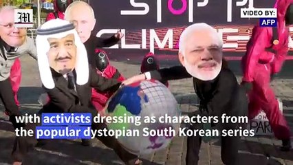 Squid Game-themed protesters 'play games' in Glasgow