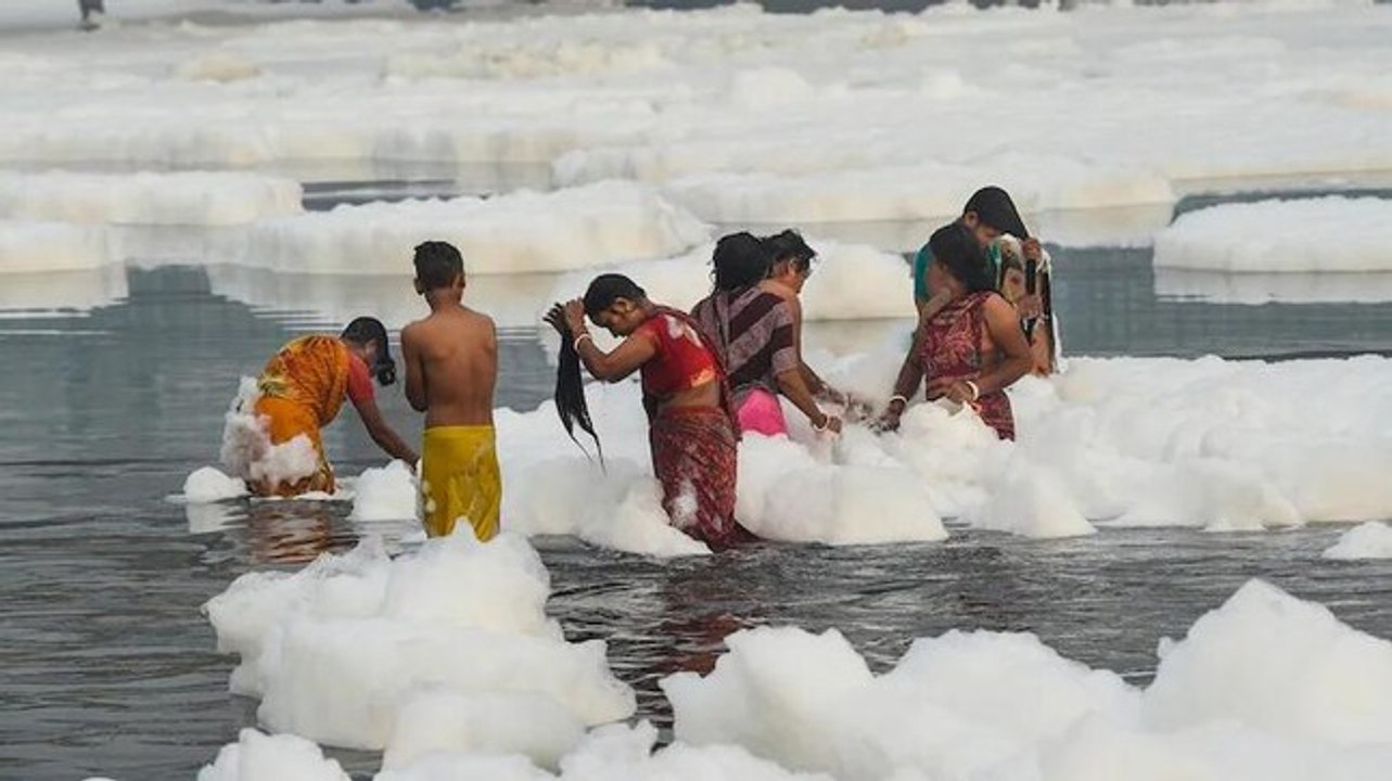 BJP, AAP spar over toxic foam in Yamuna as devotees perform Chhath Puja
