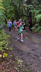 Athlete Dives Into Mud Puddle During Race