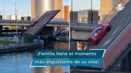 Puente levadizo se abre mientras un auto pasaba por el camino