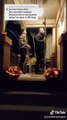 Couple Carrying Unhinged Door Does Reverse Trick-or-Treating With People After They Knock on it
