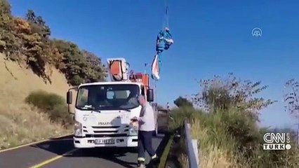 Paraşütçü elektrik tellerine takıldı