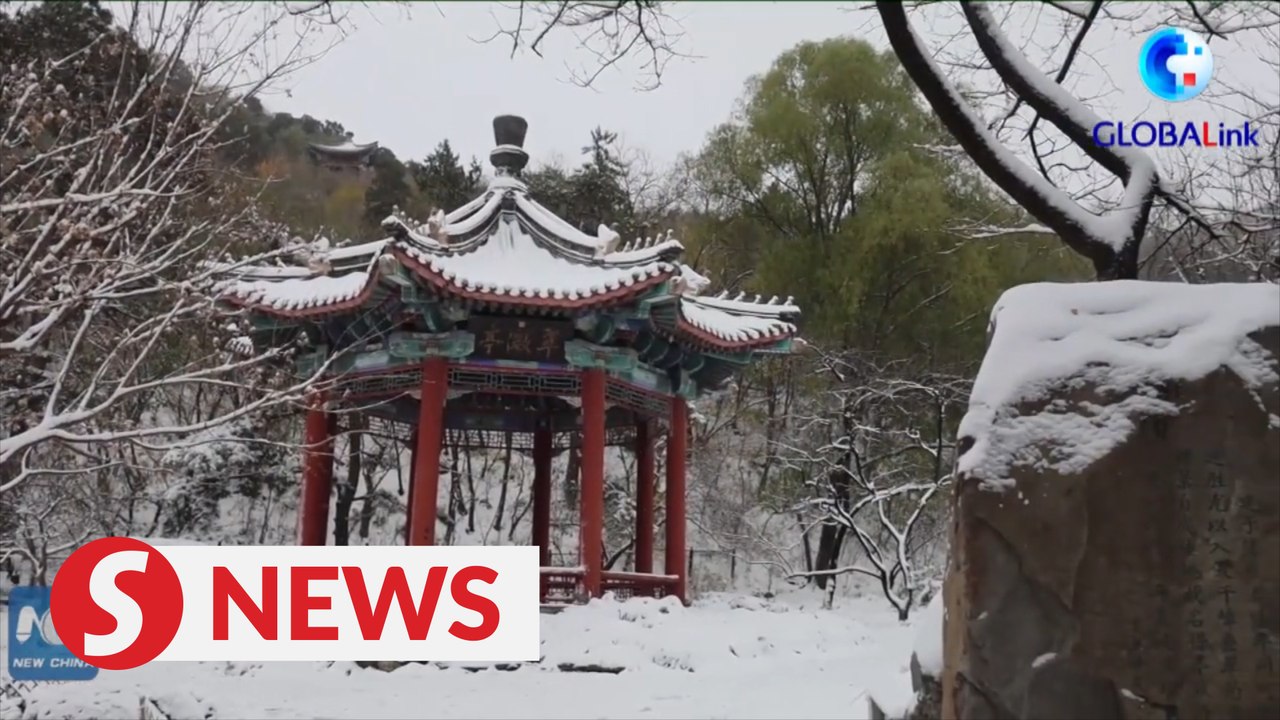 Snow-covered parks in Beijing offers picturesque scenery