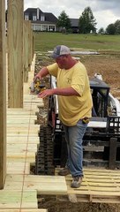 Cutting a 9 Foot Tall Deck Using a Skid Steer