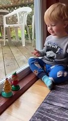 Toddler Dances With Solar-Powered Decorations