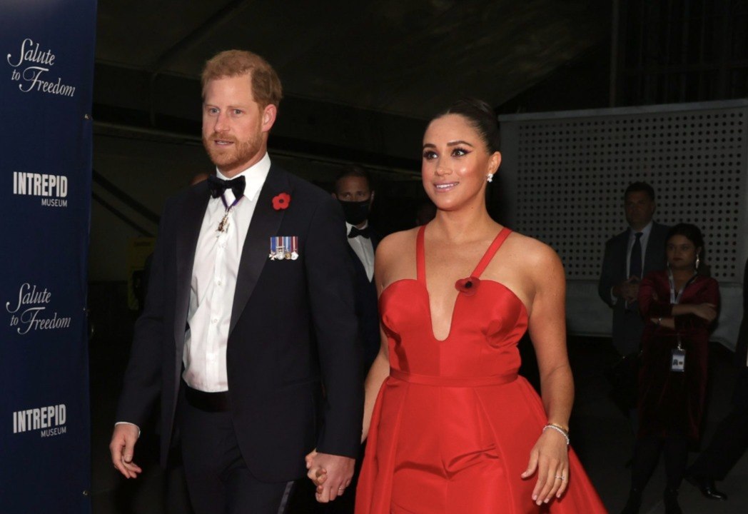 Meghan Markle Abandoned the Royal Dress Code in a Plunging Red Gown