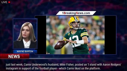 Download Video: Carrie Underwood looks unimpressed as Luke Bryan makes Aaron Rodgers immunization joke at the  - 1br