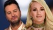 Carrie Underwood gets visibly upset with Luke Bryan after his opening joke at the CMAs,