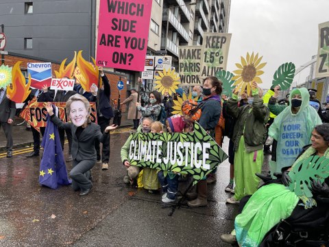 COP26: Fossil fuels or a liveable planet? Protesters march outside climate summit venue
