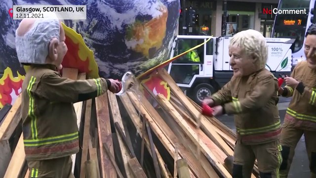 Manifestation d'activistes climatiques dans la dernière ligne droite de la COP26