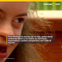 Padre e hija regalan sonrisas entre su comunidad
