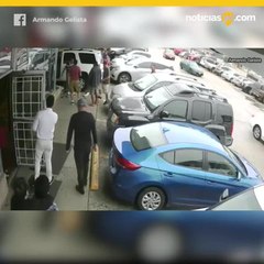 Camioneta en tienda por pelea de estacionamiento