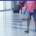 Archivo: viajeros en aeropuerto, TSA