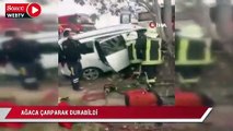 Ağaca çarparak durabilen otomobilde sıkışan sürücüyü itfaiyeciler kurtardı