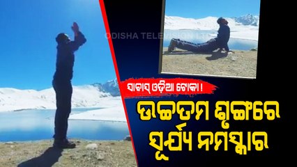 odia boy doing surya namaskar at highest peak of india
