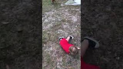 Excited Dog Knocks Kid Into Dirt