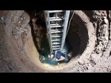 Rescuer Saves Dog Stuck in Well for Four Days