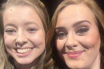 Adele calls girls from Kent up on stage at the O2