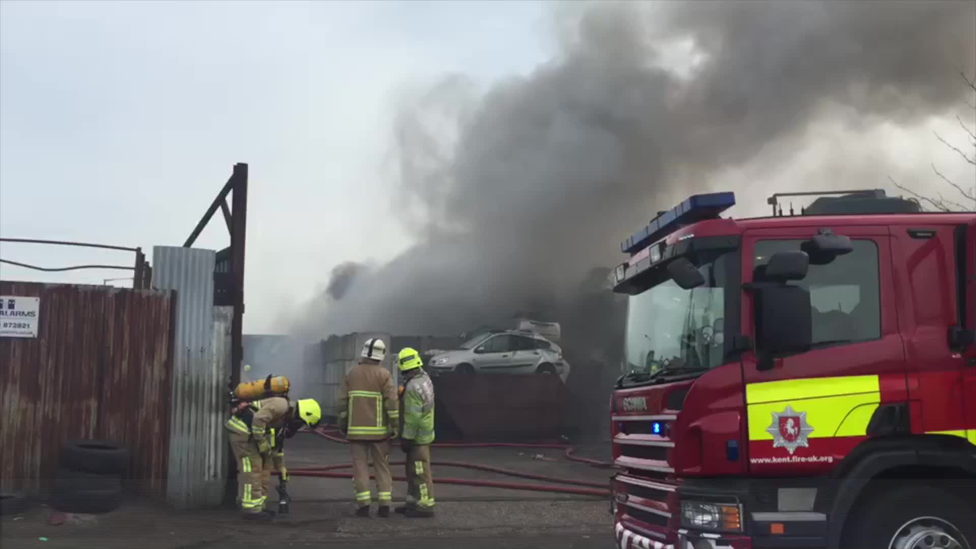 Fire crews tackle a blaze at a scrap yard