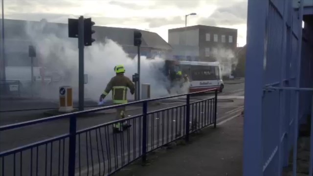Bus bursts into flames in town centre