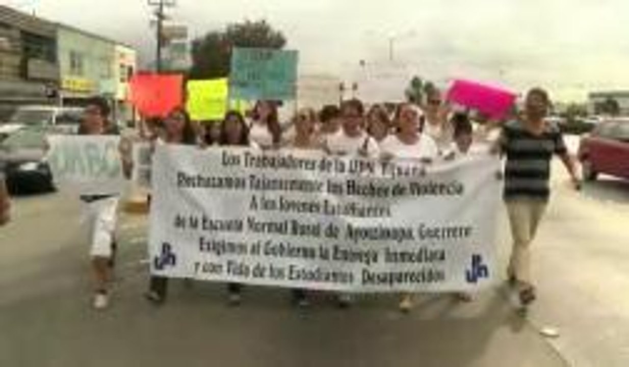 Universitarios marchan en protesta por estudiantes desaparecidos