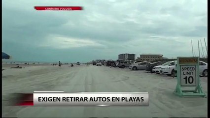 Exigen retirar autos de las playas