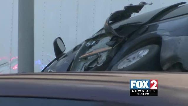 Semi-Truck Pins Minivan between Cement Median, One Transported to Hospital