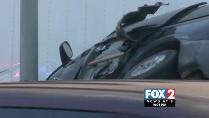 Semi-Truck Pins Minivan between Cement Median, One Transported to Hospital