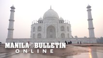 India welcomes back tourists but smog shrouds Taj Mahal