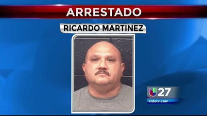 Oficial policiaco arrestado