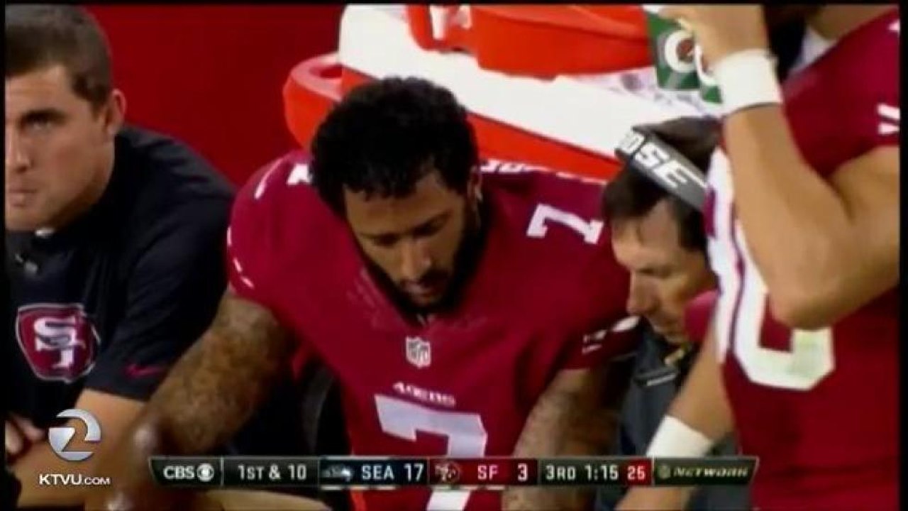 MIXED REACTION TO KAEPERNICK BENCHING