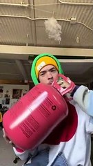 Man Tests Helium Blown Bubbles