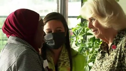 Camilla cradles baby at 'inspirational' women's event