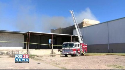 Authorities are waiting on approval to demolish a burned warehouse