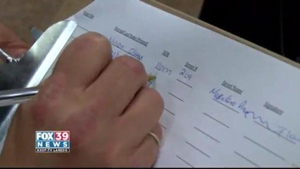 Moving Laredo Forward collecting signatures at the Webb County tax office