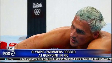 US OLYMPIC SWIMMERS ROBBED AT GUNPOINT IN RIO