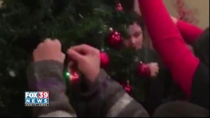Girl Scouts Troop 9136 and 9167 Decorate Bethany House ChristmasTree
